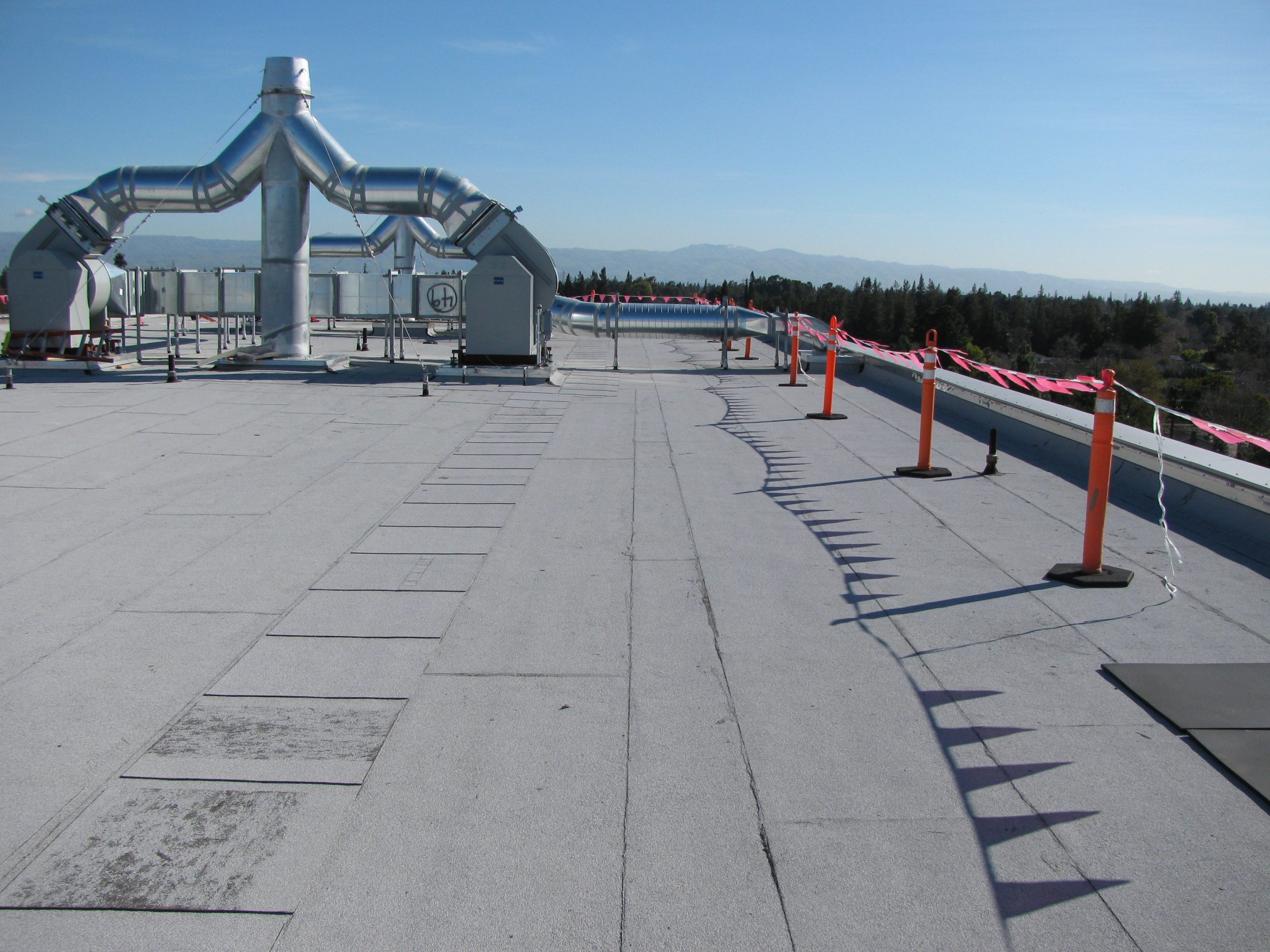 Occupied Building Reroofing - commercial roofing in Richmond, VA